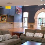 Common area lounge in Founders Hall with comfy sofas