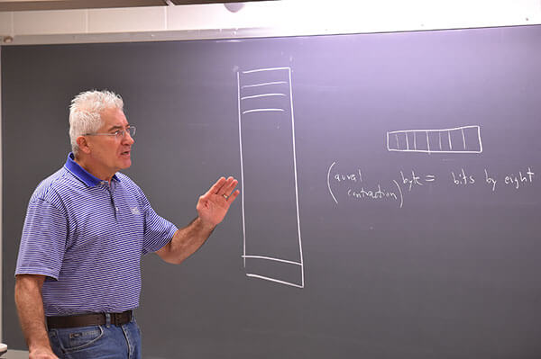 Arthur Hanna, Ph.D., teaches a Computer Science course.