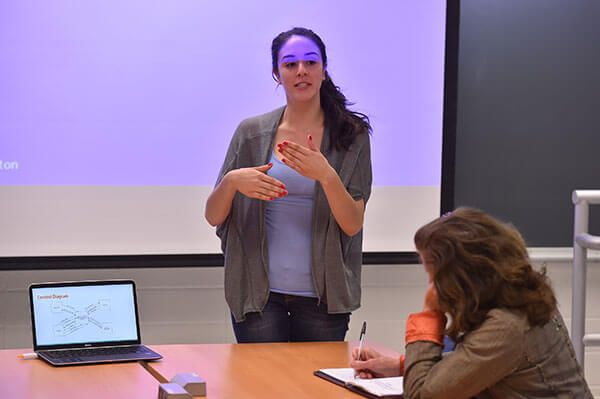 Student gives a speech in the class of Pamela Fink, Ph.D.