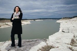 Hardberger stands near the Medina Lake dam