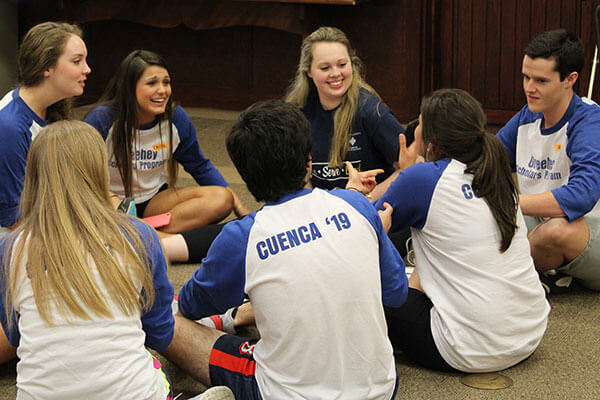 Greehey Scholars sit together and talk during orientation