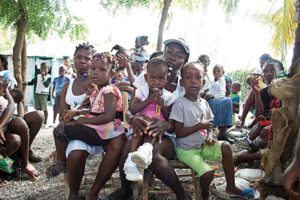 A Haitian mother and her children at a health clinic