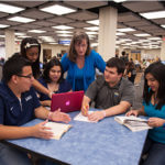 St. Mary's University professors and students study in the Blume Library.