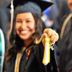 A McNair student at commencement