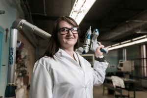 Female STEM student in a lab