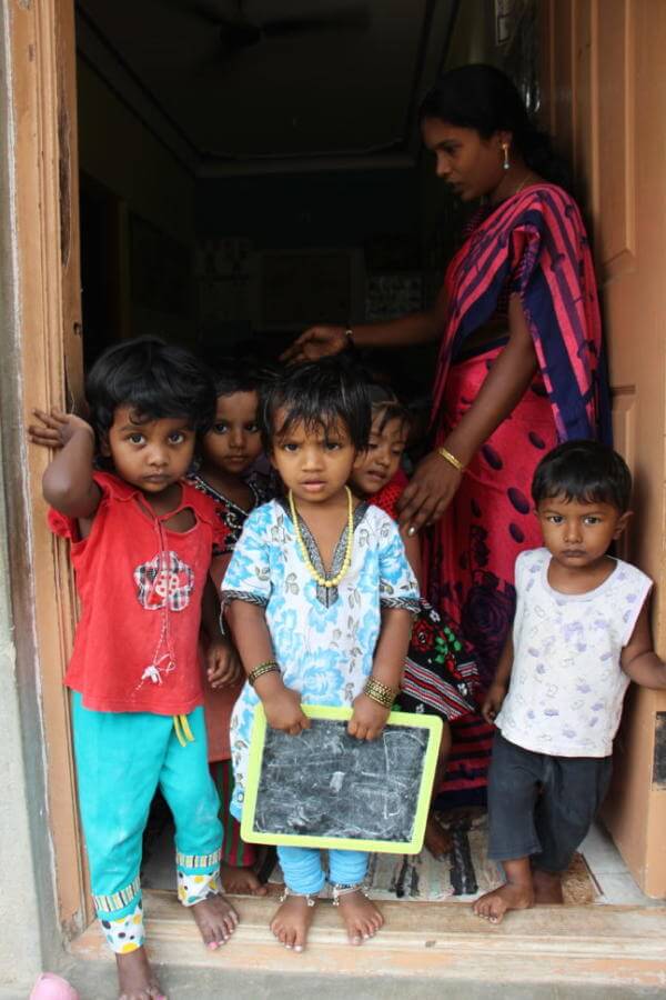 Children in the Marianist schools in Bangalore's slums say goodbye to visiting St. Mary's students.
