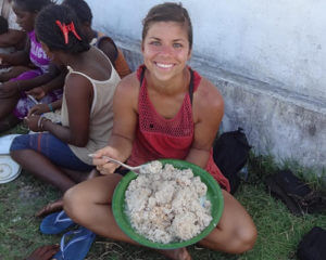 Samantha Bezdek eating a bowl of rice