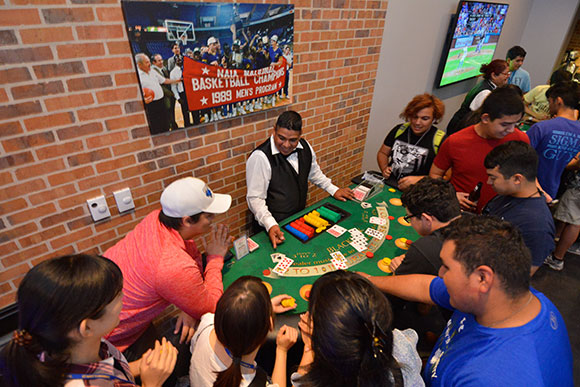 Students play poker at Casino Night at The Pub at St. Mary's.