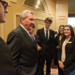 Bill Greehey speaks with Greehey Scholars at the 2016 Business Week awards dinner.