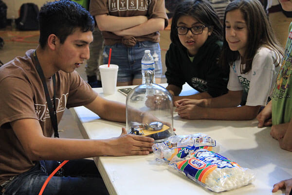 Students conducting a physics experiment