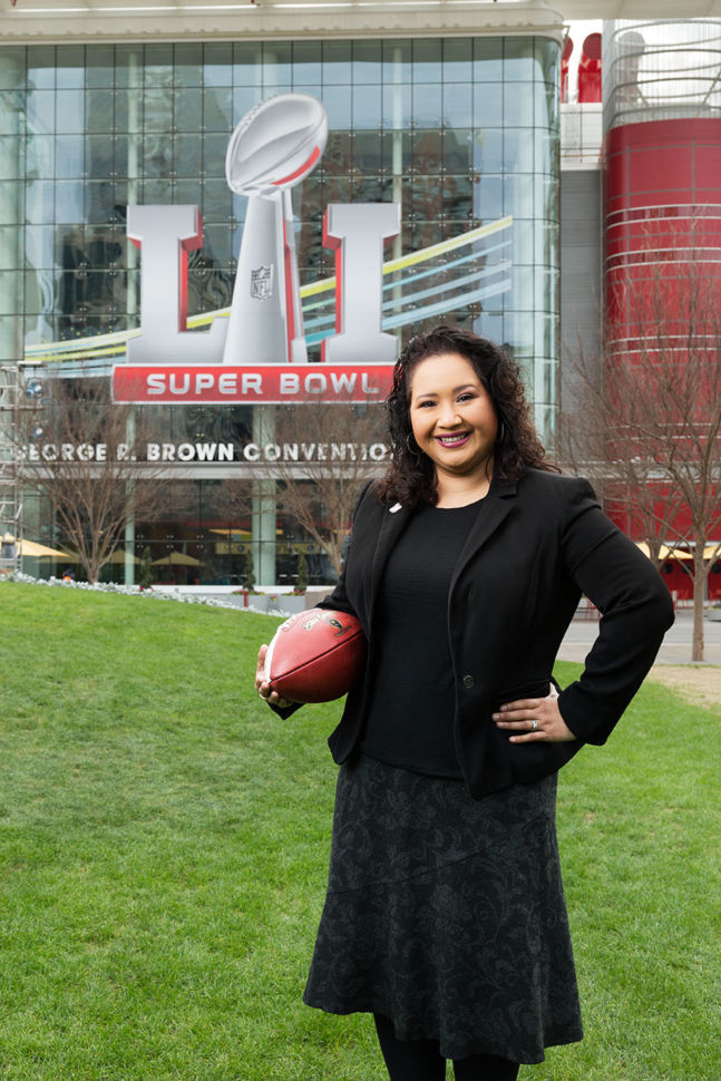 Erica Baum in front of the Houston stadium