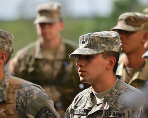 Profiles of four ROTC cadets in uniform