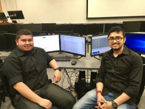 Cybesecurity graduate students Erick Buenostro and Goutham Rukmasah.