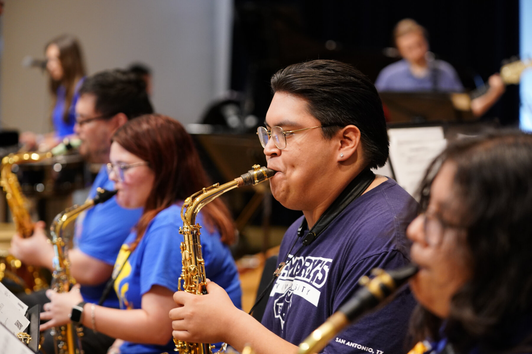 Students practice playing their instruments in the St. Mary's University Treadaway Recital Hall.