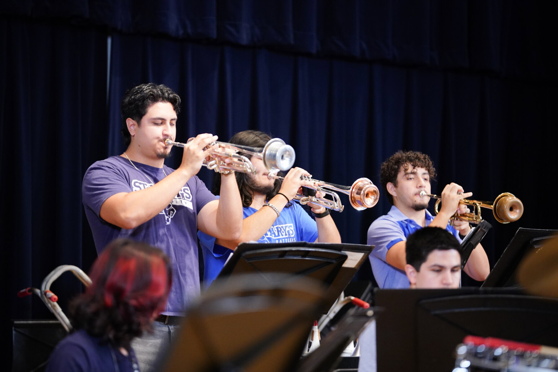 Students practice playing the trumpet.