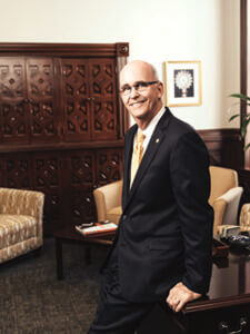 President Tom Mengler poses in his office.
