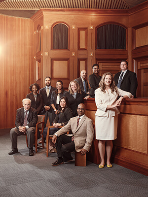 Law Success Program instructors and Director Zoe Niesel stand in the St. Mary's .