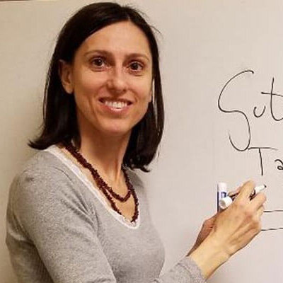 Stefania Malcrida writing on white board with marker