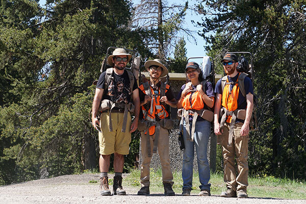 Student Rebeca Gurrola stands with research group at Yellowstone.