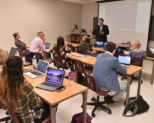 Psychology students in a classroom.