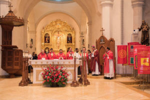 Priests in red vestments lead Red Mass in Fall 2017.