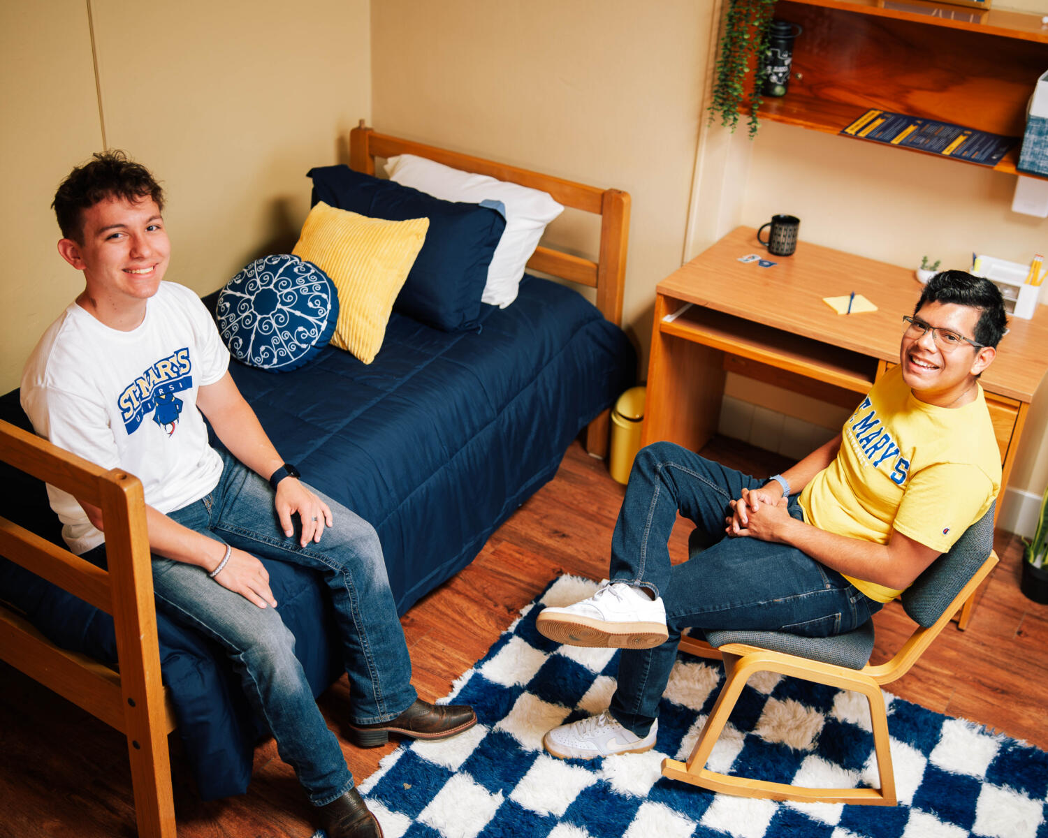 Two male students in Marian Hall Room.