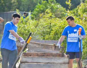 Continuing the Heritage volunteers work to clean up a garden.