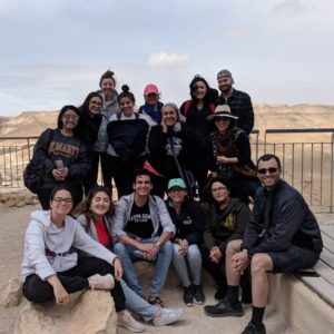 The group poses in Israel