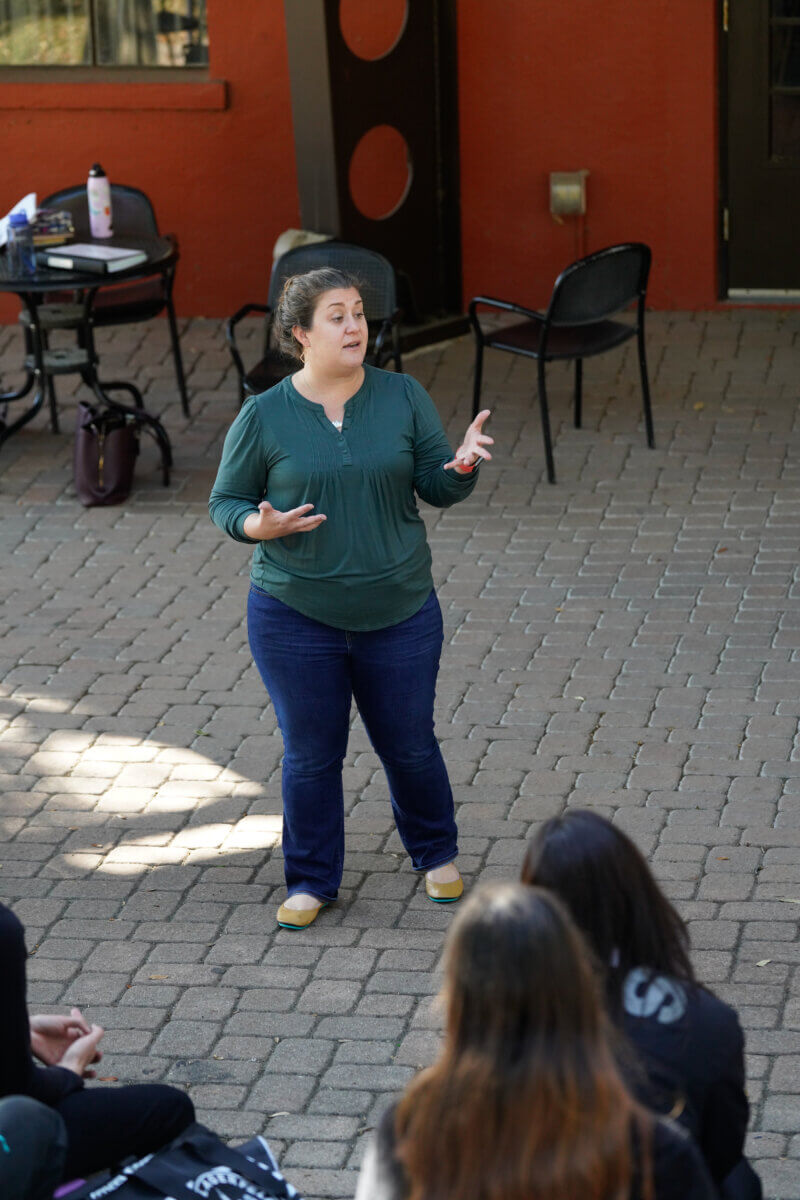 Faculty member recites poetry during the annual St. Mary's University Poetry and the Engaged Citizen.