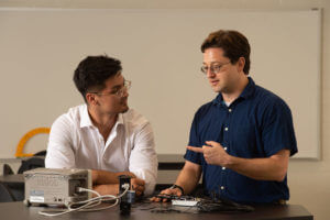 Jose Figueroa and Richard Lombardini discuss physics.