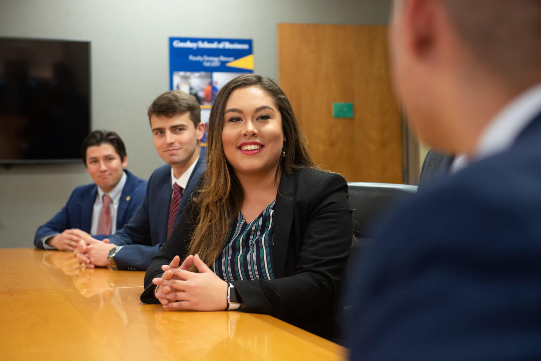 Students meet with a potential employer during Business Week.