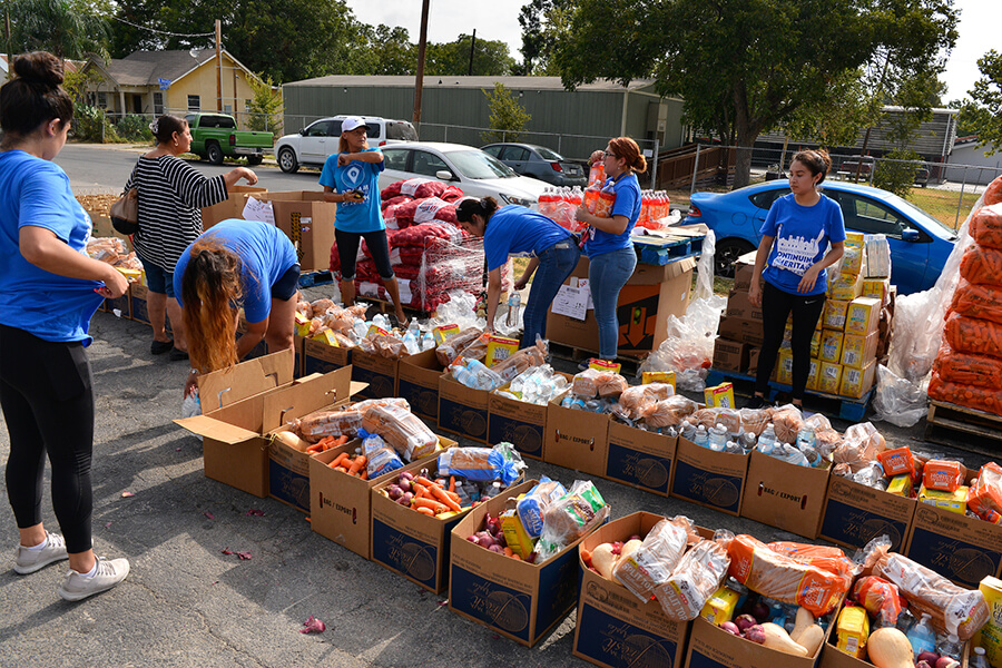 Students help with food packaging during Fall 2019 Continuing the Heritage.