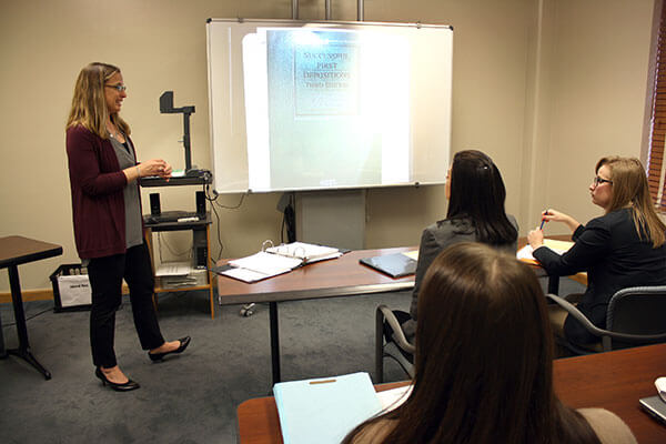 St. Mary’s Clinical Professor of Law Genevieve Hébert Fajardo leads a Civil Justice Clinic class.