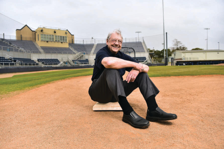 Michael “Mickey” Schott (B.B.A. ’68) sitting on first base