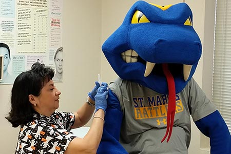 Rattler Man getting a flu shot