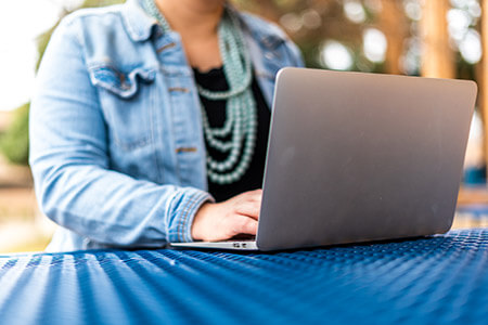 student working on laptop