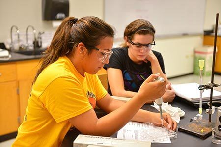 biochemistry students in a lab