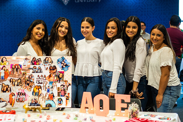 A sorority poses during Rattler Roundup