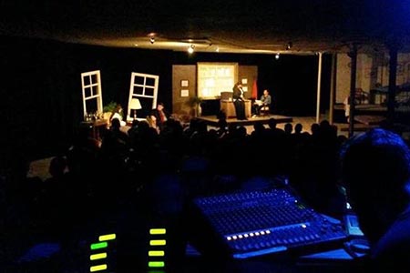 A production of A Girl in a Mirror viewed from behind the sound booth