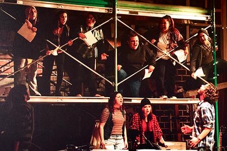 A group of theatre students performing Rent the Musical