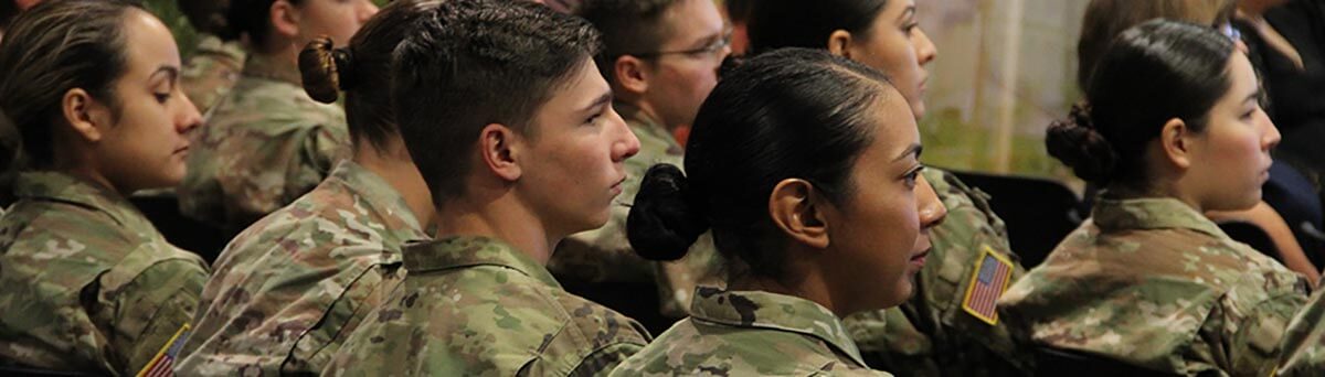 St. Mary's ROTC members sit together in uniform