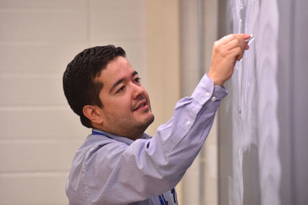Juan Ocampo at the blackboard