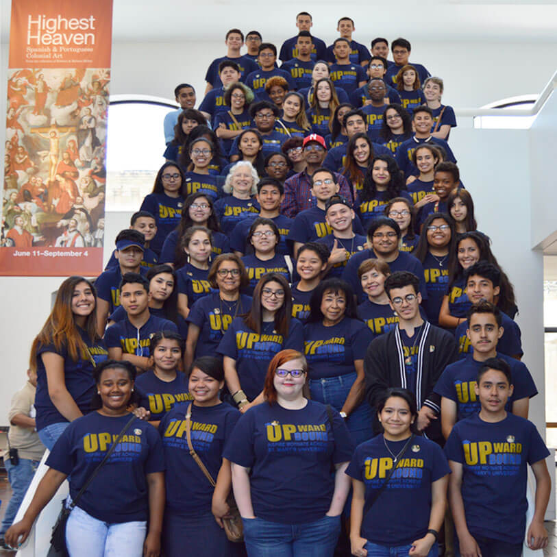 A large group of Upward Bound students on a staircase