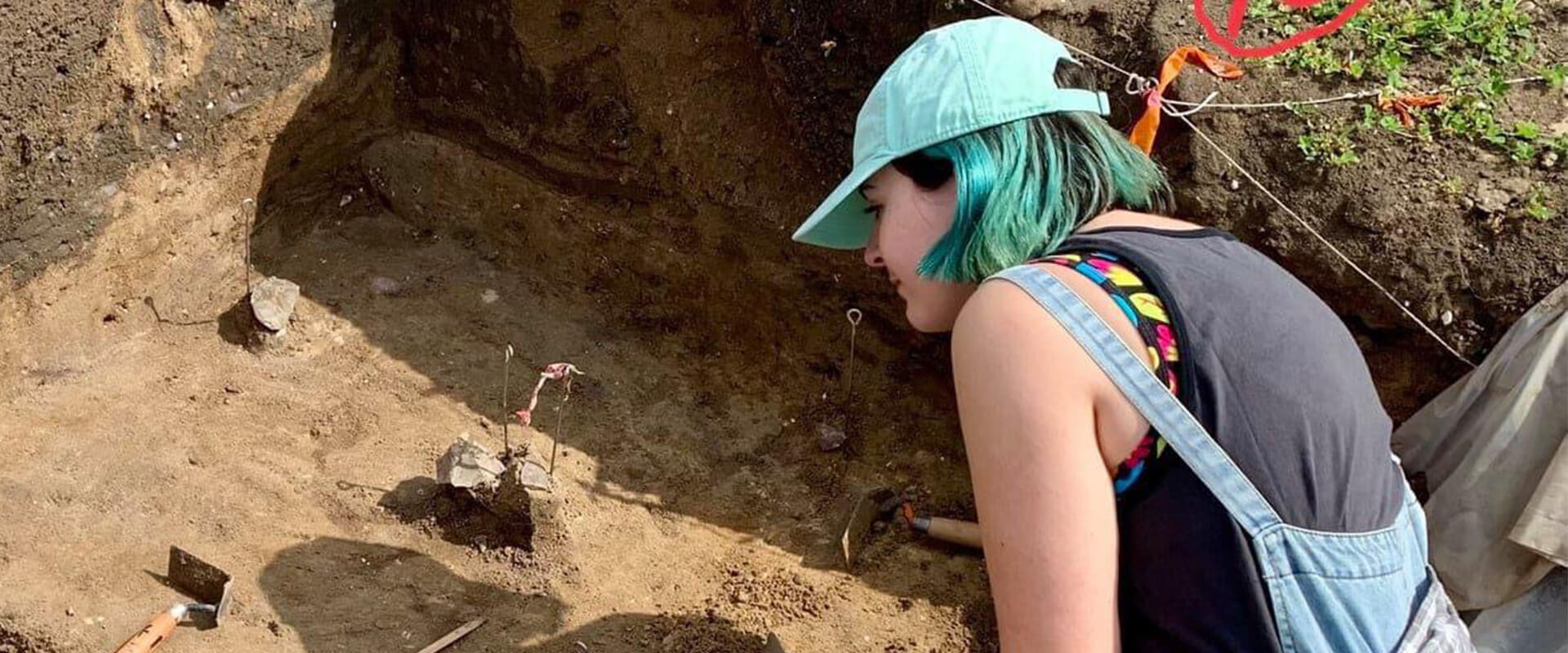 Public History student Glory Turnbull on a dig
