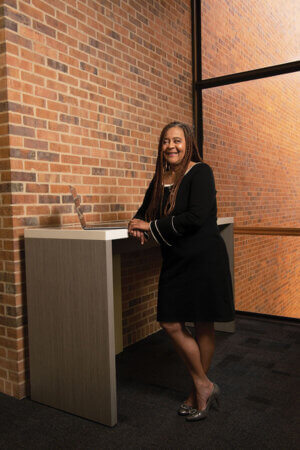 Laura Thompson stands in the Graduate Center for Excellence.