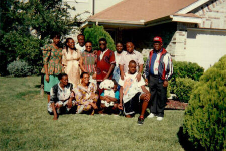 Jeddidah Thotho with then-Professor of English Elijah Akhahenda and his family.