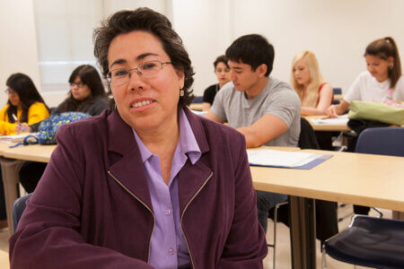 Sonia Garcia leads a class of students.