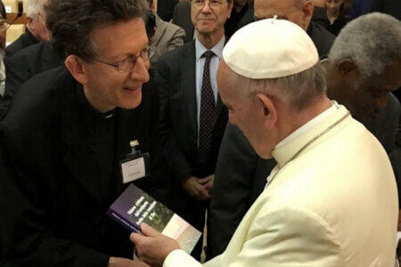 The Rev. Paul Haffner meets Pope Francis in a courtesy photo.