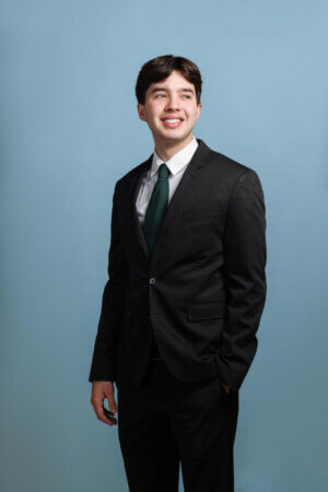 Alvaro Garza, president of the Environment, Conservation and Outreach (ECO) Club, poses for a photo.