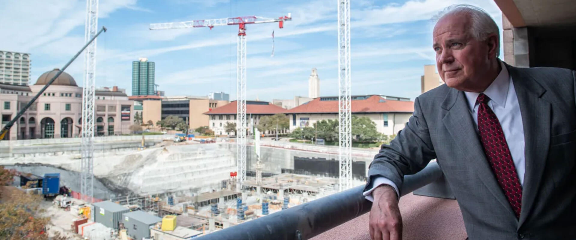 Texas Facilities Commission Executive Director Mike Novak overlooks the Capitol Complex Project construction site in 2019. The site, located at 1801 Congress Ave., is being transformed into a five-story underground parking garage, office building, and grass mall. Credit: Angela Piazza for the San Antonio Report
